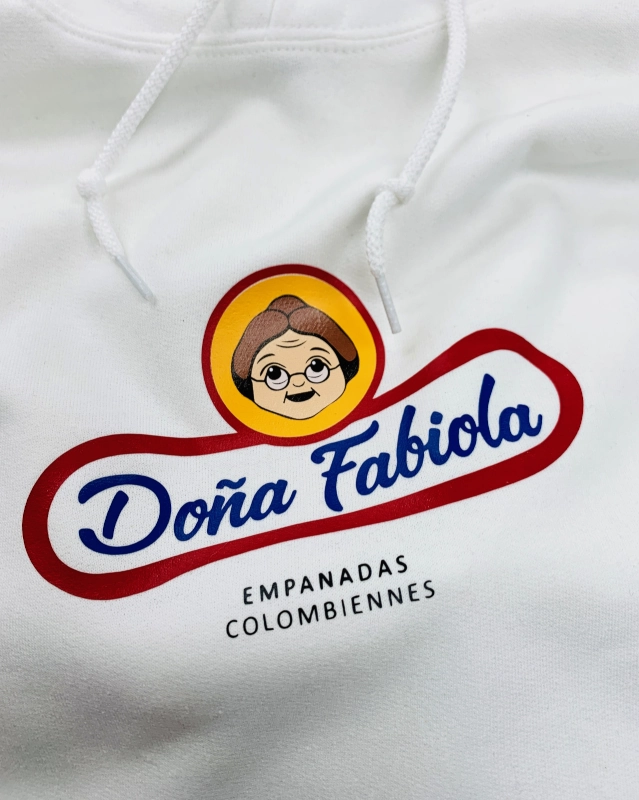 EM Visions Portfolio Dona Fabiola large scale printing branding embroidery clothing logos